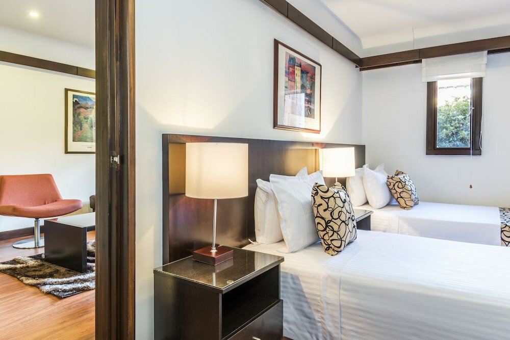 Фото Travelers Suites Condominio Plenitud