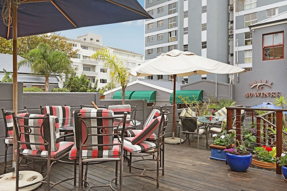 Фото 40 Winks Guest House Green Point Cape Town
