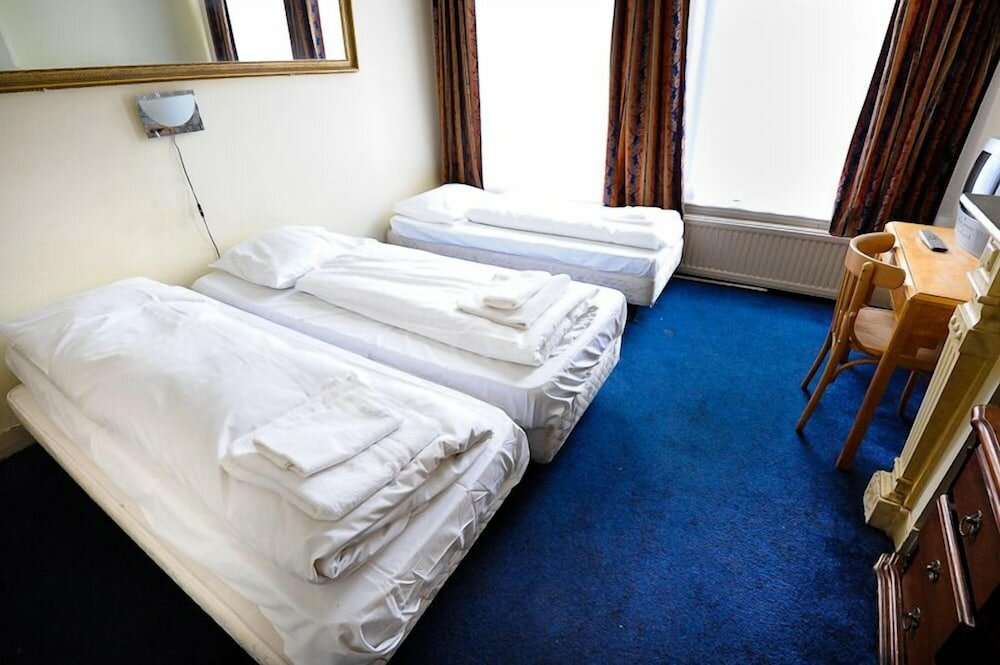 Фото Amsterdam Inn Hotel