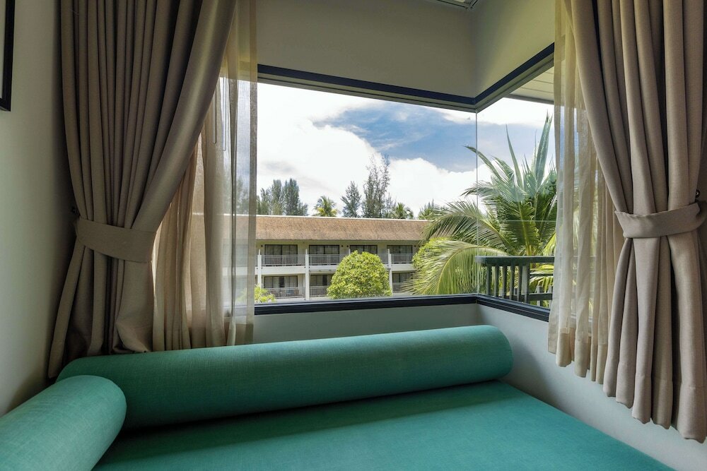 Фото Outrigger Khao Lak Beach Resort