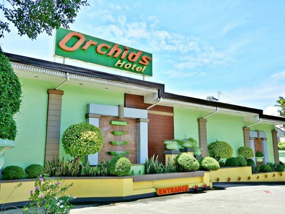 Hotel Orchids Drive Inn Hotel and Restaurant, Earth, photo