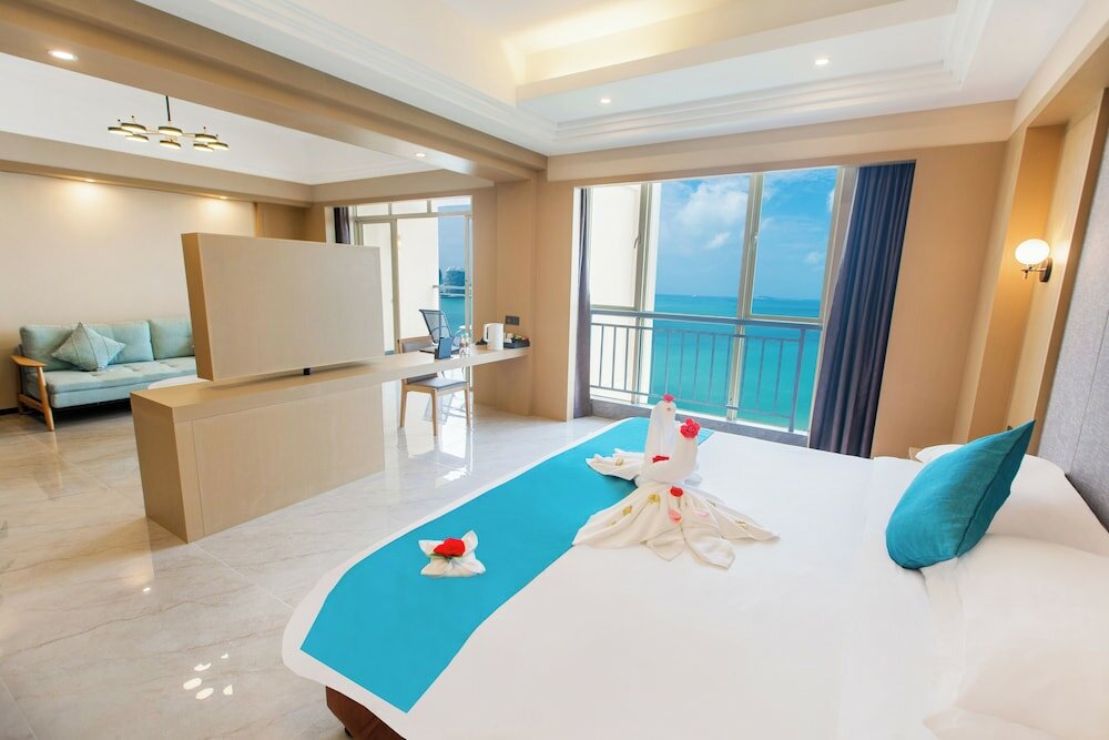 Фото Shengyi Holiday Villa Hotel & Suites Sanya 