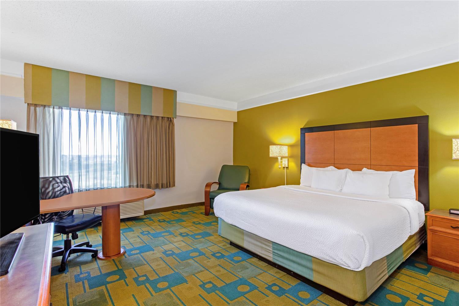 Фото La Quinta Inn & Suites by Wyndham Orlando i Drive/Conv Ctr