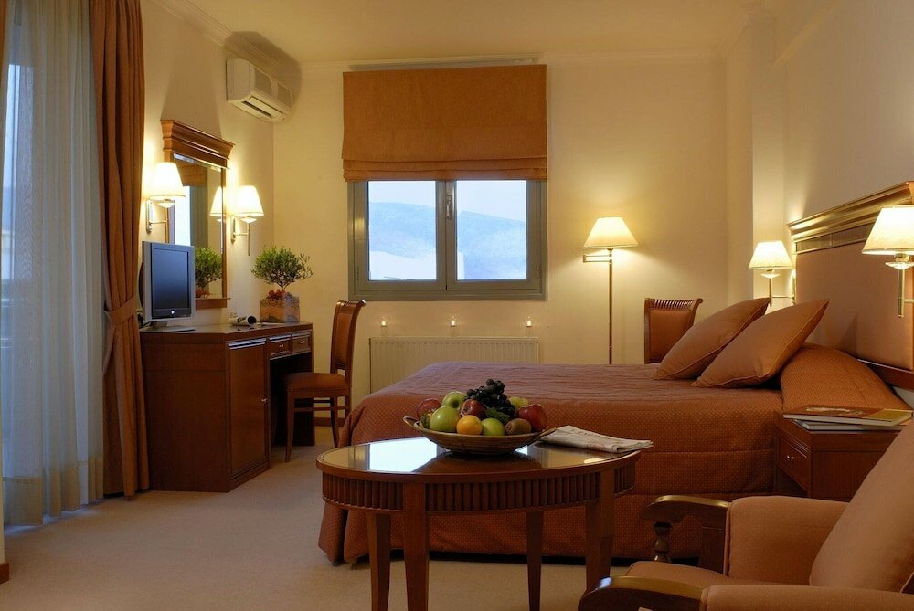 Фото Athens Atrium Hotel and Suites