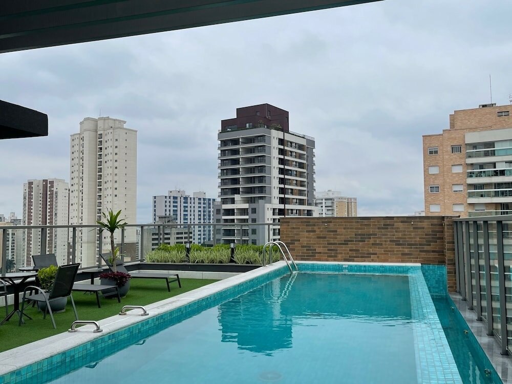 Фото Cozzy Suítes Paraíso Hotel