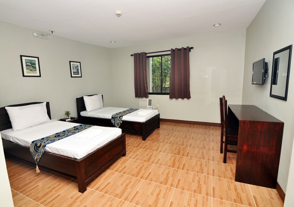 Фото Harbour Gardens Tourist Inn