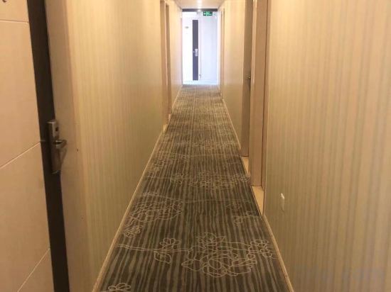 Фото Jiujiuyuan Hotel