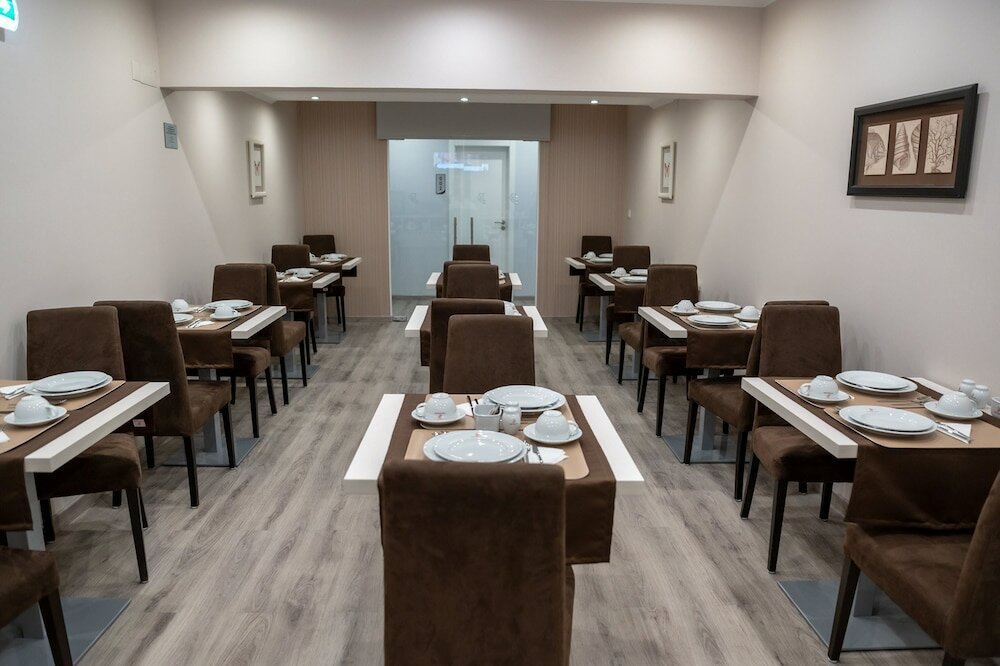Фото Dinya Lisbon Hotel & Lounge Bar