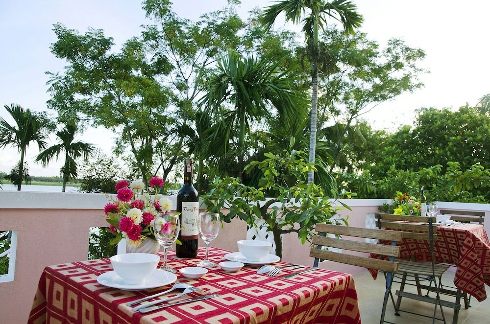 Фото Thu Bon Riverside Homestay