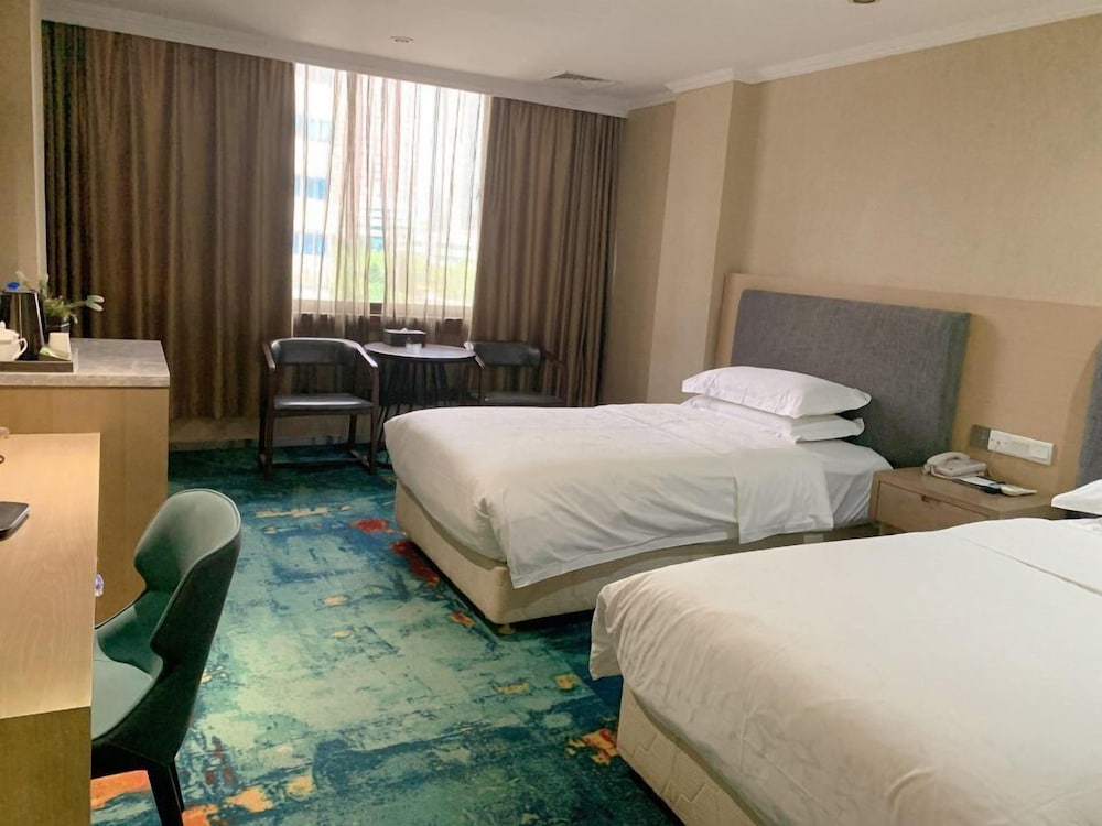 Фото Kaiserdom Hotel Guangzhou Ouzhuang