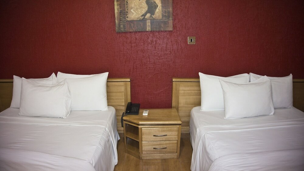 Фото Tropical Enclave Hotel