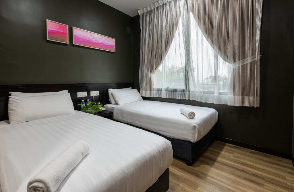 Фото Wang's Hotel Gurney Drive