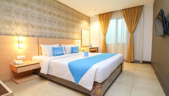 Фото Grand Impression Hotel Medan