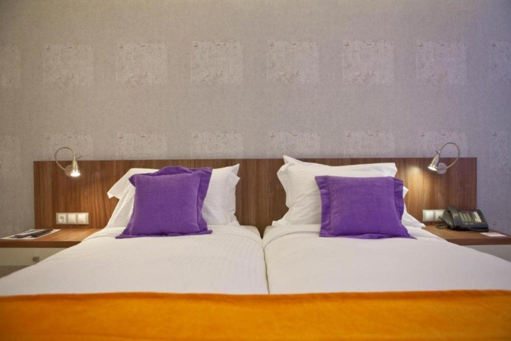 Фото Novus City Hotel