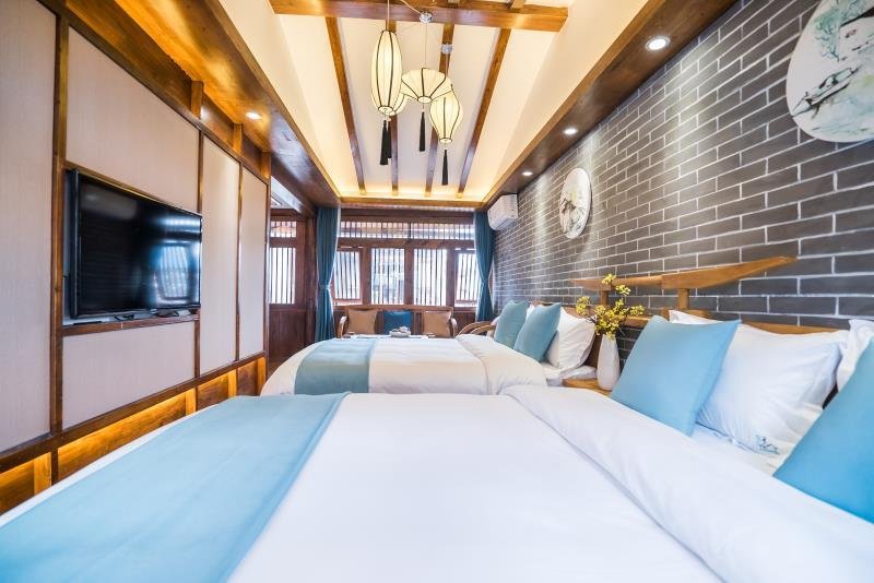 Фото Lijiang Yue Tu Inn