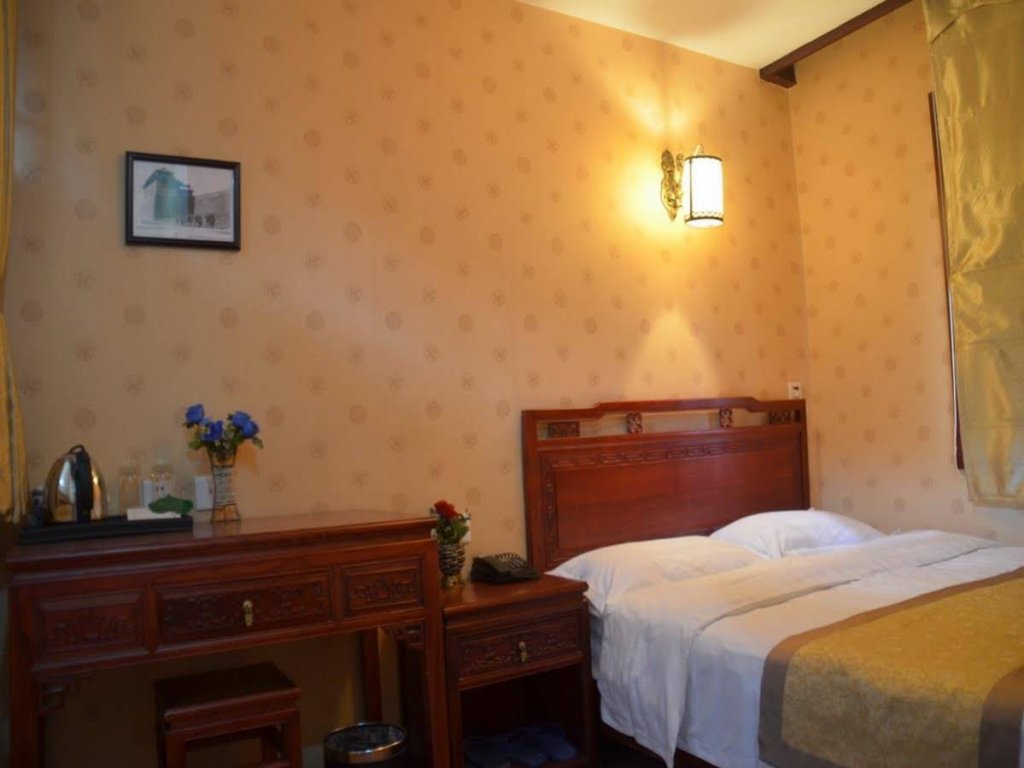 Фото Qianmen Courtyard Hotel