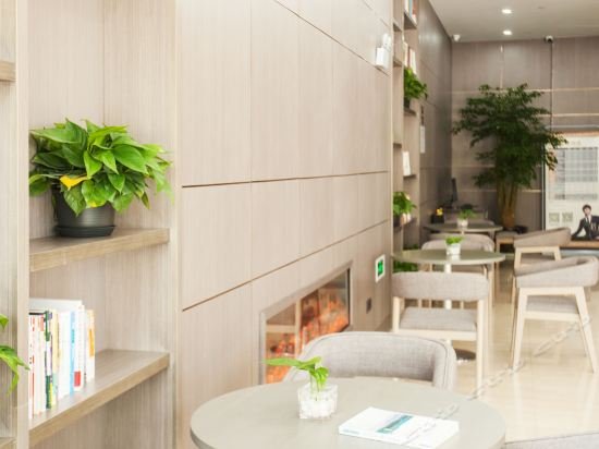 Фото Gya Jiaxing Tongxiang City Century Avenue Hotel