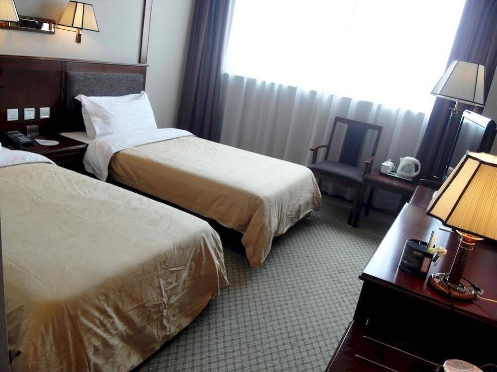 Фото Shanghai Weson Grand Hotel