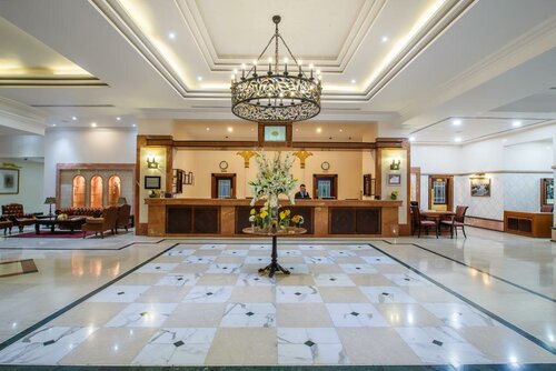 Гостиница Hotel Holiday International в Шардже