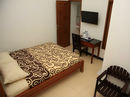 Гостиница Puri Kusuma Guest House в Табанане
