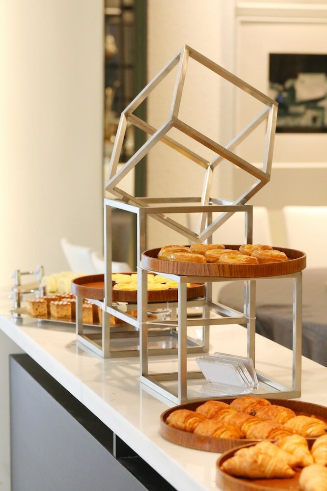 Фото Jinjiang Metropolo Hua Ting Guest House