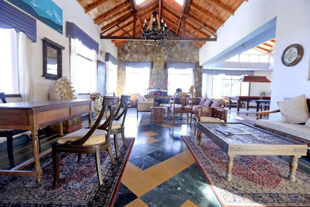 Фото Woodsvilla Resort