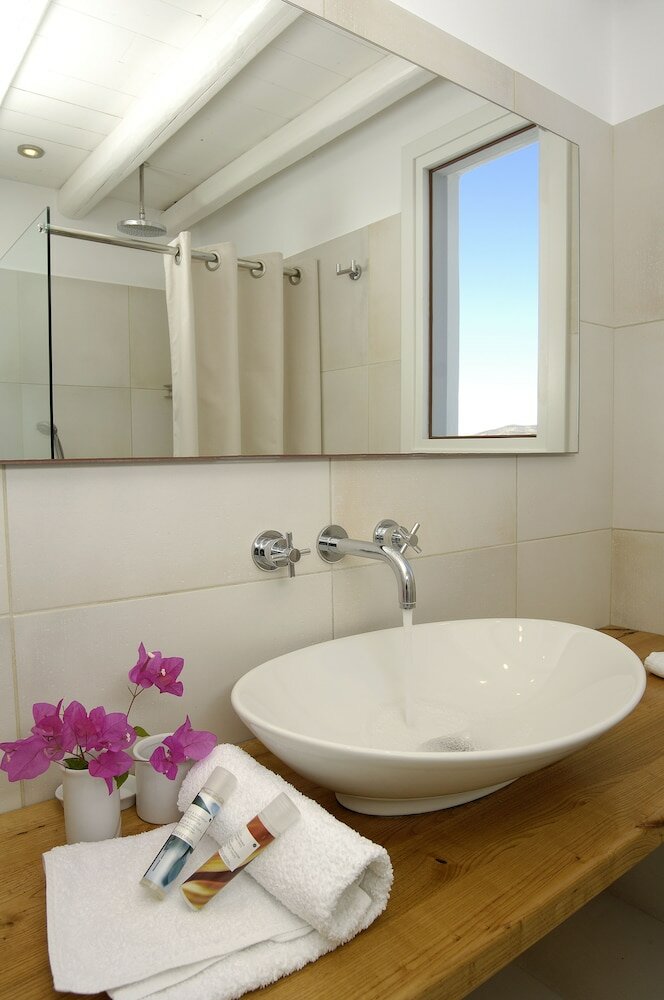 Фото Kapetan Tasos Suites