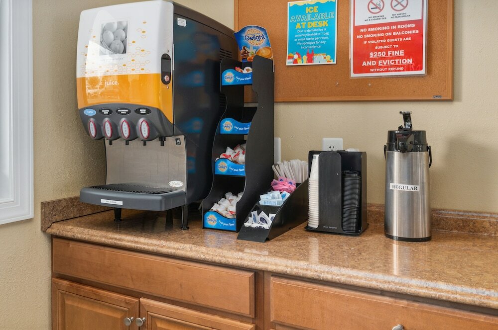 Фото Coastal Palms Inn & Suites