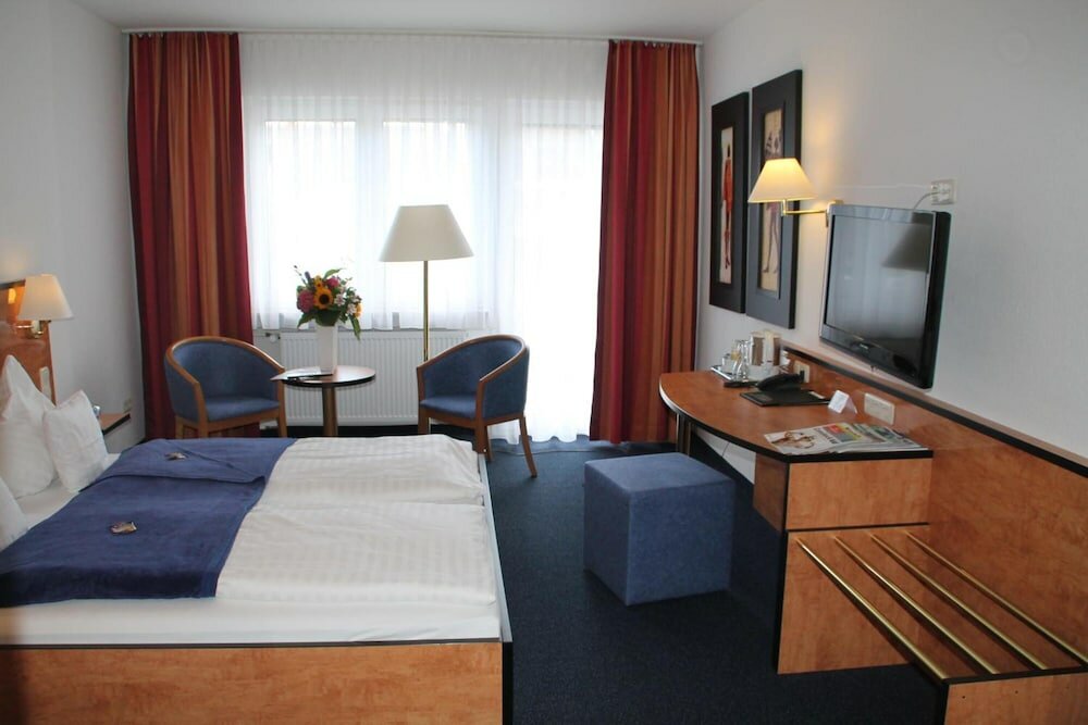 Фото Hotel Römerhof by Trip Inn