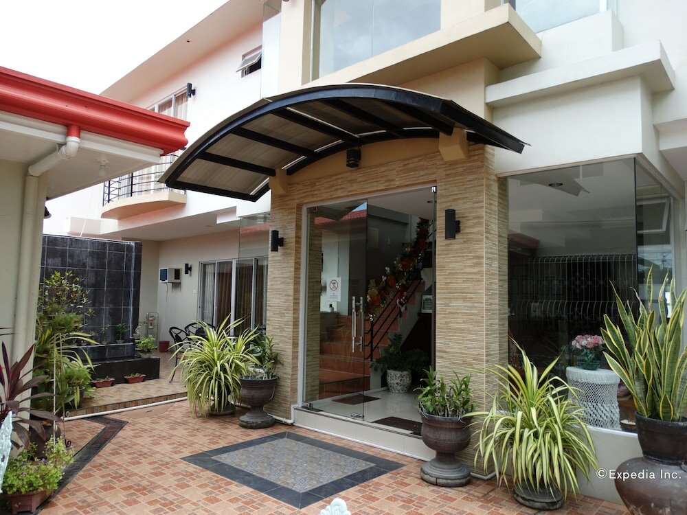 Фото Harbour Gardens Tourist Inn