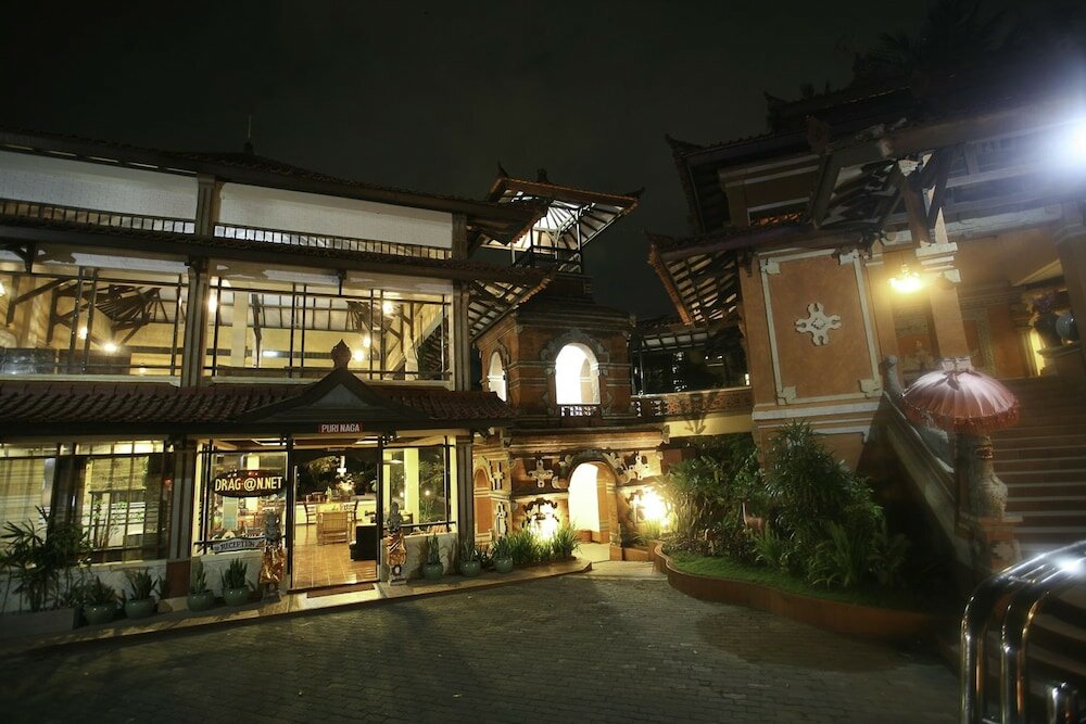 Фото Puri Naga Beachfront Cottages