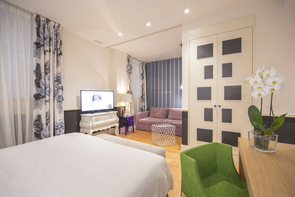 Фото Cinque Luxury Rooms