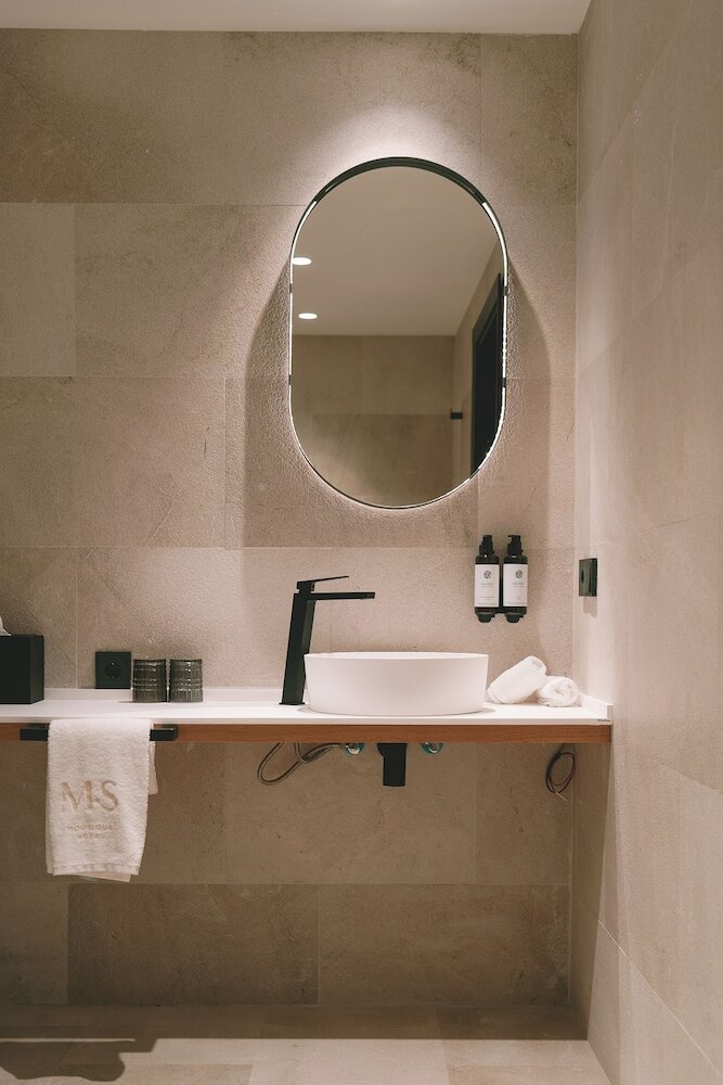 Фото Boutique Hotel Petit Montisión