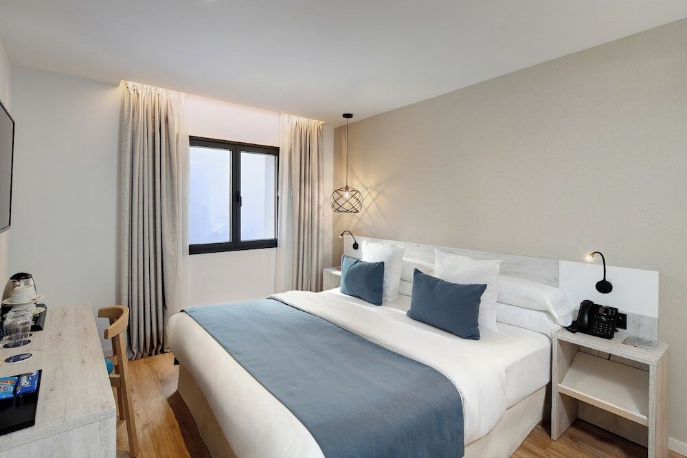 Фото Óbal Urban Hotel