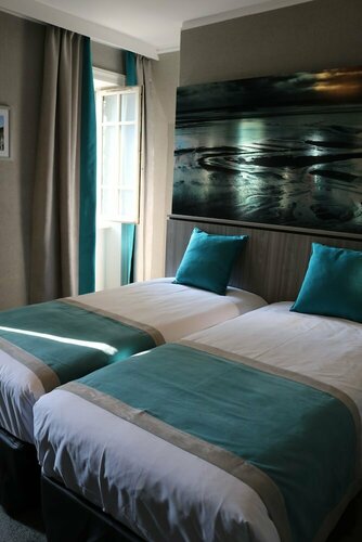 Гостиница Hôtel Les Terrasses Poulard в Авранше