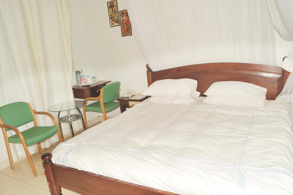 Фото New Scroll Inn Hotel