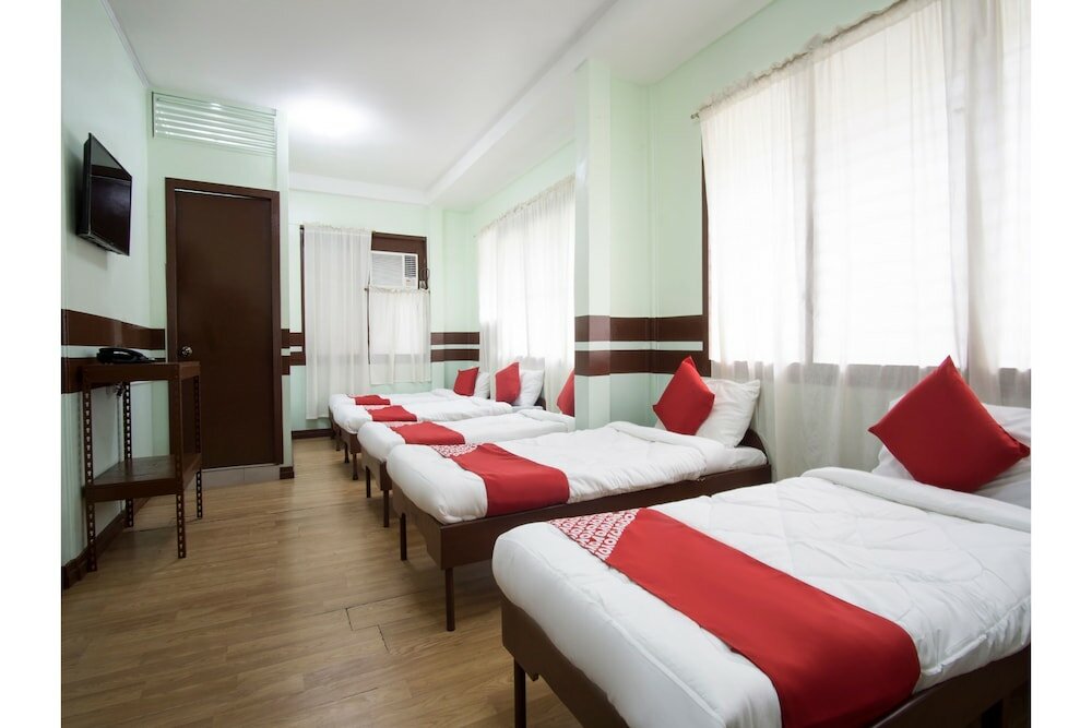 Фото Oyo 130 Jy Crown Palace - Hostel