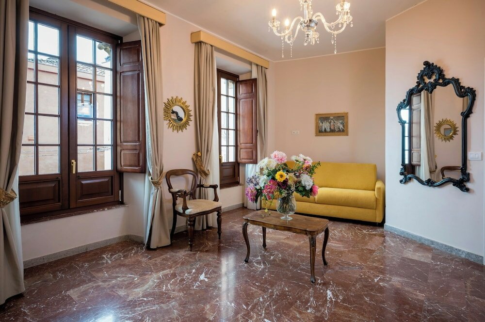 Фото Porta Di Mezzo Luxury B&b