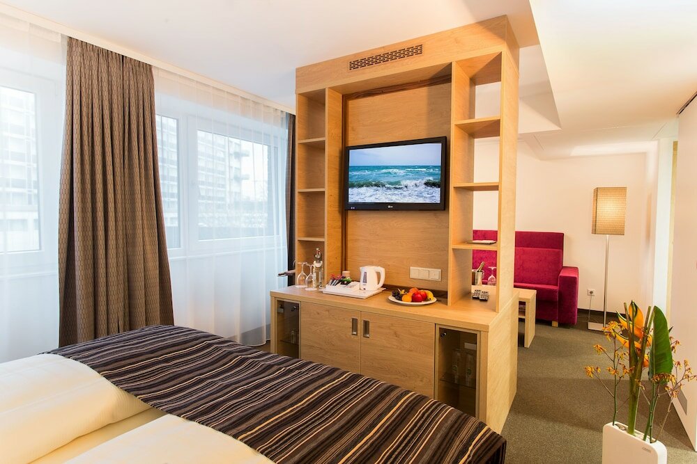 Фото Stadthotel am Römerturm