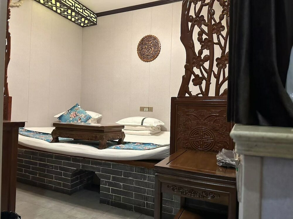 Фото Pingyao Hongyuyuan Inn