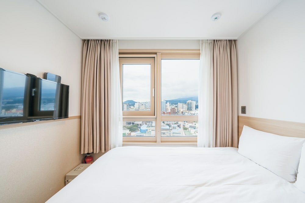 Фото Kenny Stay Jeju Seoguipo-Hotel Kenny