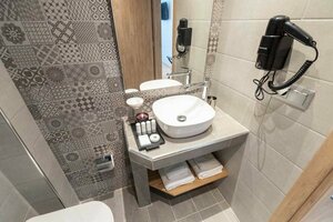 Гостиница Grand Port Suites Thessaloniki