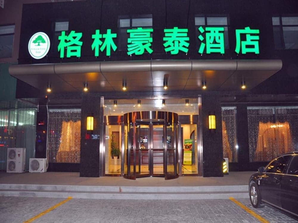 Фото GreenTree Inn Taizhou Taixing East Guoqing Road Rt Mart Business Hotel