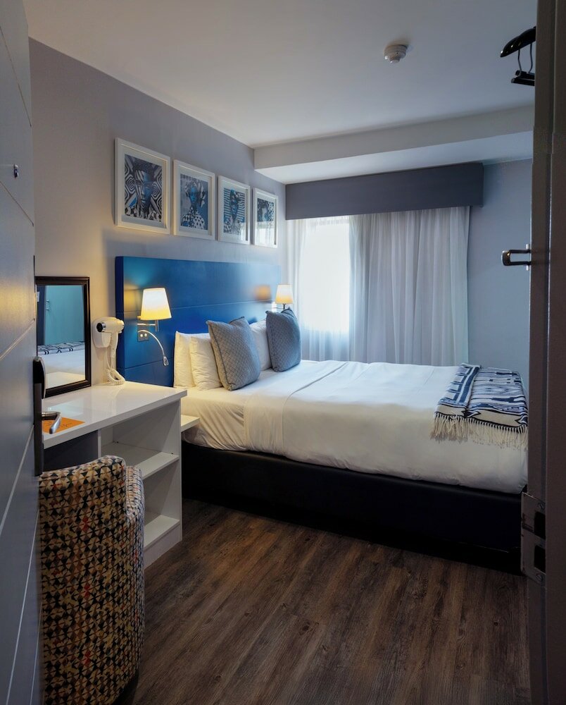 Фото Signature Lux Hotel, by Onomo