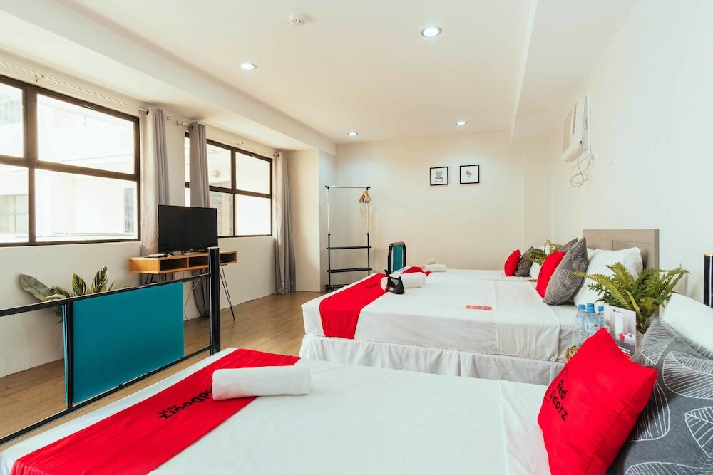 Фото Oyo 443 Maria Cristina Arcade Suites