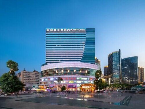 Гостиница New Era Hotel в Куньмине