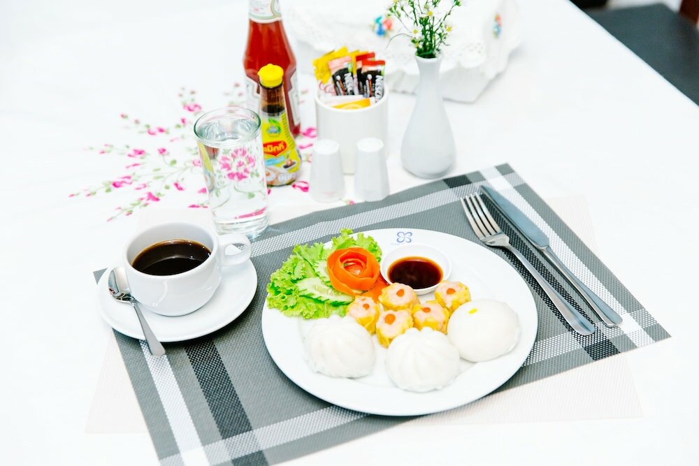 Фото Sinkiat Thani Hotel