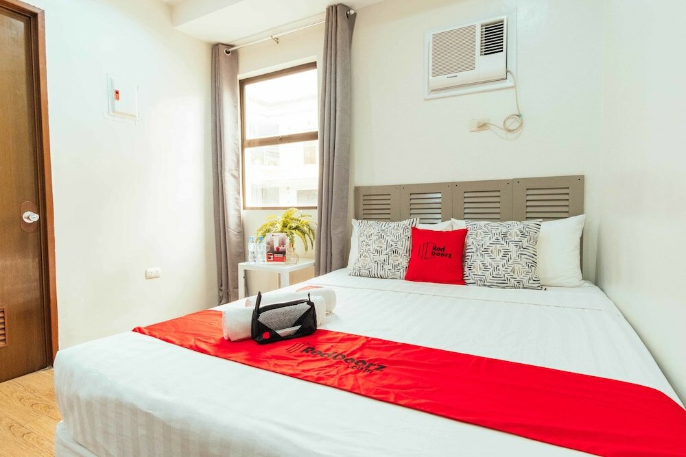 Фото Oyo 443 Maria Cristina Arcade Suites