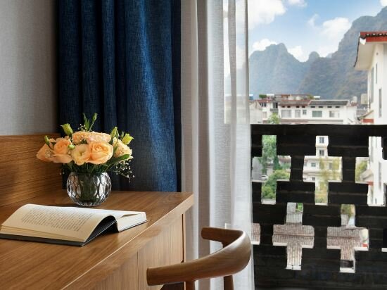 Фото Yangshuo Qingyunge Hotel