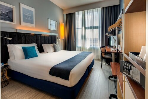 Внешний вид отеля Holiday Inn Bologna Fiera в Болонье, фото 2